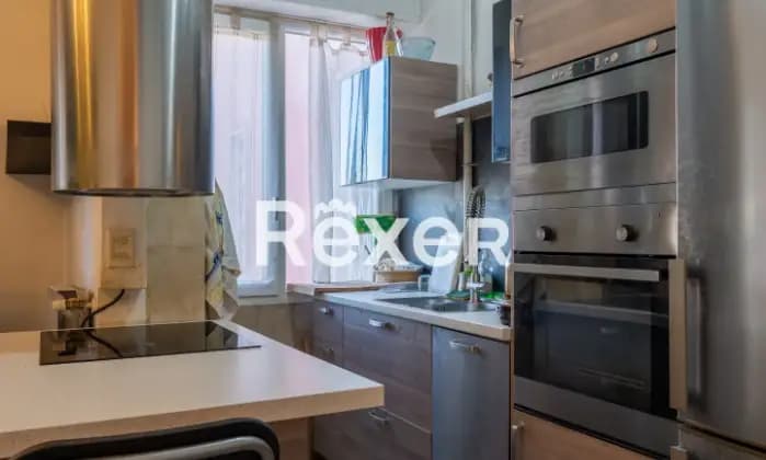 Rexer-Brescia-Trilocale-mq-con-balcone-cantina-e-posto-auto-Cucina