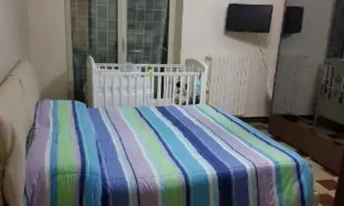 Rexer-Napoli-Appartamento-in-contesto-privato-CAMERA-DA-LETTO