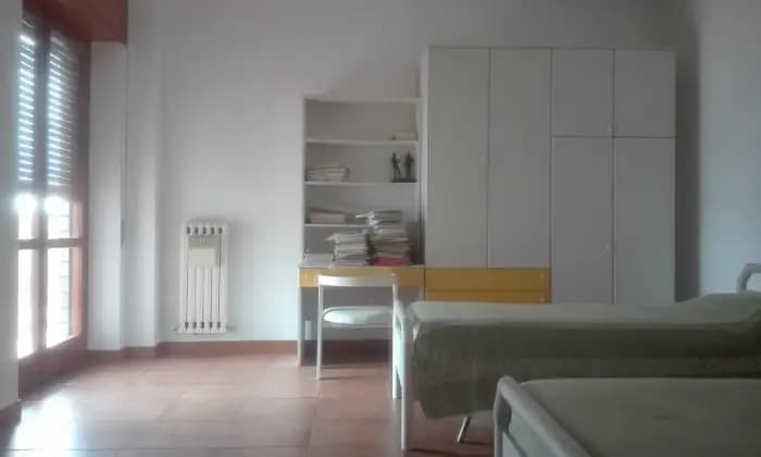 Rexer-Cosenza-Appartamento-con-tre-bagni-e-vista-panoramica-CAMERA-DA-LETTO