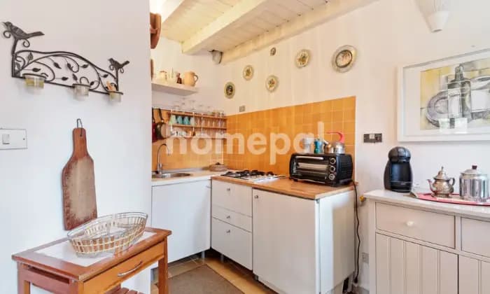 Rexer-Carro-AFFASCINANTE-CASA-LIVELLI-CON-TERRAZZI-CUCINA