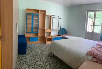 Rexer-Cagliari-Camera-dippia-anche-uso-ingola-in-appartamento-CAMERA-DA-LETTO