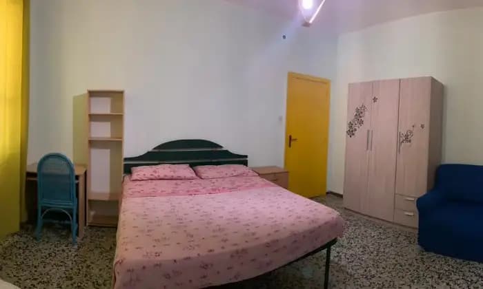 Rexer-Cagliari-Camera-doppia-uso-singola-in-appartamento-CAMERA-DA-LETTO