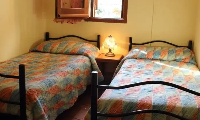 Rexer-Domus-de-Maria-Casa-vacanze-in-affitto-CAMERA-DA-LETTO