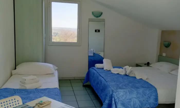 Rexer-Vittoria-In-vacanza-in-villaggio-turistico-CasaVacanze-Le-Mansarde-in-Athena-Resort-Scoglitti-RG-CAMERA-DA-LETTO