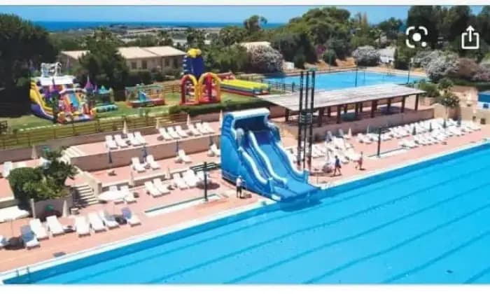 Rexer-Vittoria-In-vacanza-in-villaggio-turistico-CasaVacanze-Le-Mansarde-in-Athena-Resort-Scoglitti-RG-piscina-olimpionica