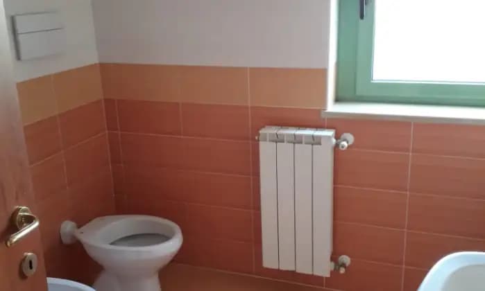 Rexer-San-Giuliano-di-Puglia-Appartamento-con-terrazzo-e-garage-Bagno