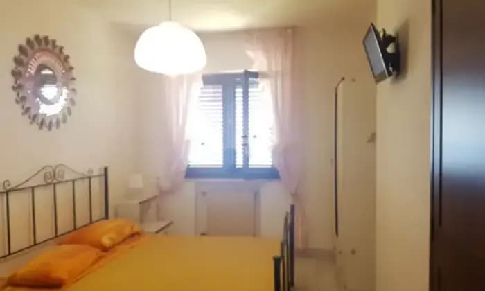 Rexer-Perito-Appartamento-in-vendita-in-via-dei-Greci-CameraDaLetto