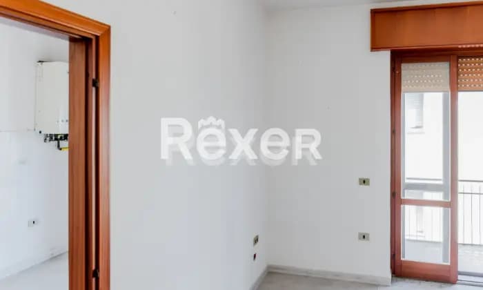 Rexer-Lioni-Luminoso-appartamento-con-balconi-CAMERA-DA-LETTO